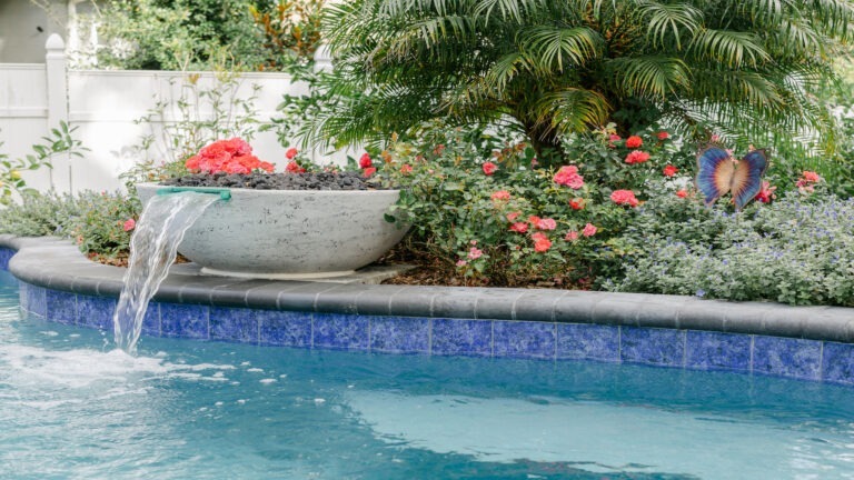 Tropical Backyard Pool - Cascade Cove designed by Amelia Outdoors