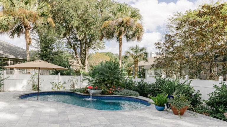 Tropical Backyard Pool - Cascade Cove designed by Amelia Outdoors