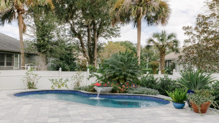 Tropical Backyard Pool - Cascade Cove designed by Amelia Outdoors