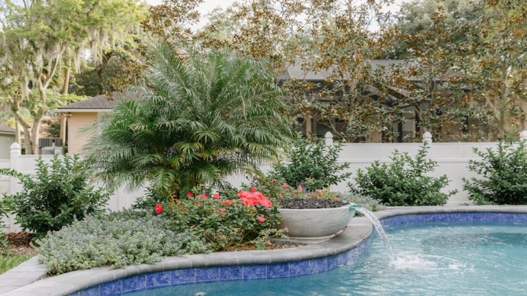 Tropical Backyard Pool - Cascade Cove designed by Amelia Outdoors