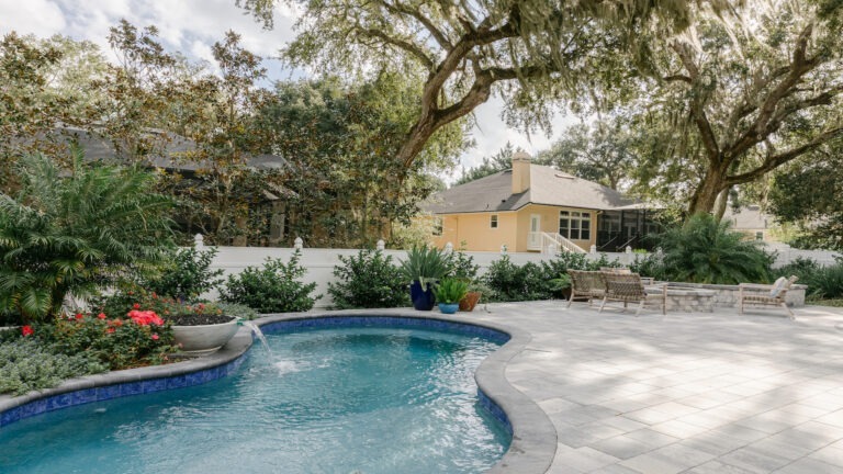 Tropical Backyard Pool - Cascade Cove designed by Amelia Outdoors