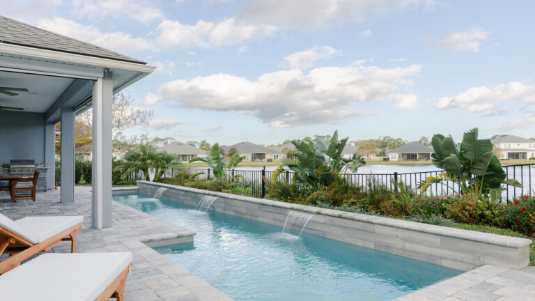 Custom Pool with Water Feature - Poolside Escape an Amelia Outdoors Design