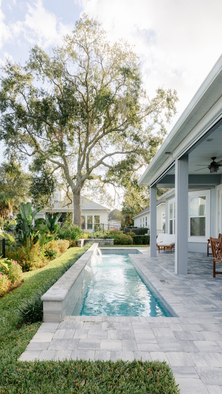 Custom Pool with Water Feature - Poolside Escape an Amelia Outdoors Design