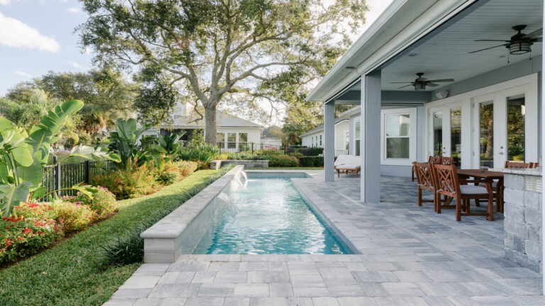 Custom Pool with Water Feature - Poolside Escape an Amelia Outdoors Design