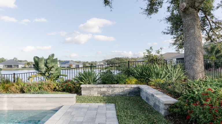 Custom Pool with Water Feature - Poolside Escape an Amelia Outdoors Design