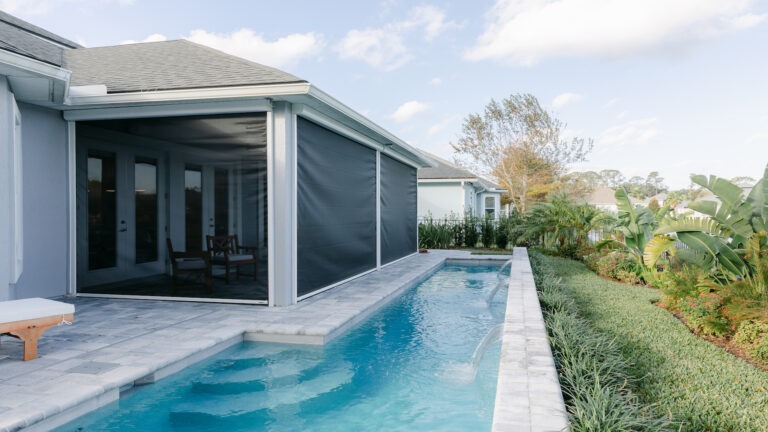 Custom Pool with Water Feature - Poolside Escape an Amelia Outdoors Design