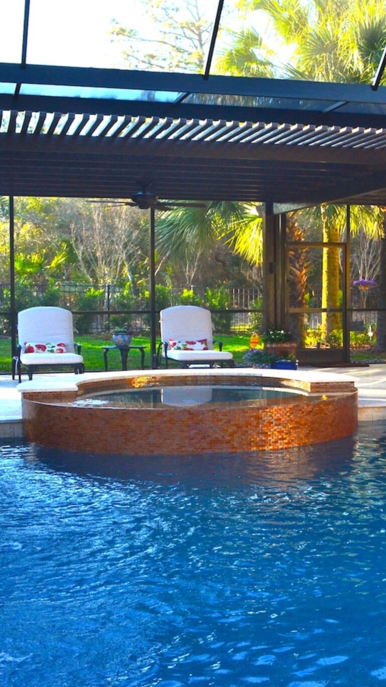 Enclosed Pool with Waterfall | Wonderwall an Amelia Outdoors Design