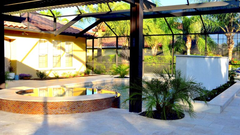 Enclosed Pool with Waterfall | Wonderwall an Amelia Outdoors Design