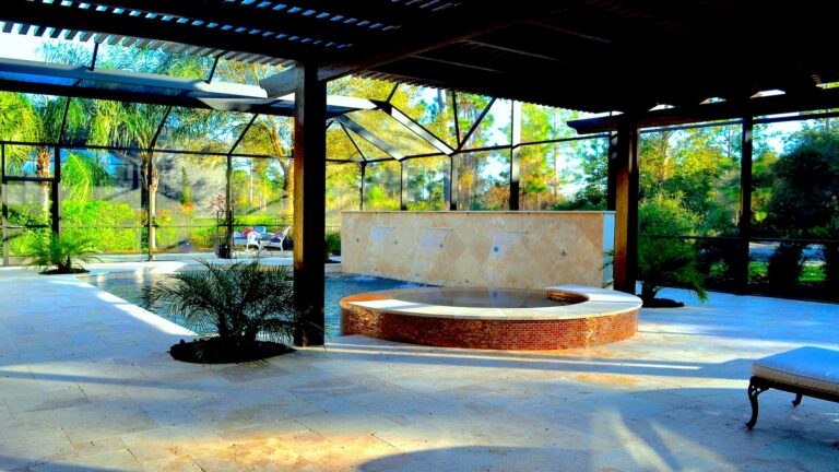 Enclosed Pool with Waterfall | Wonderwall an Amelia Outdoors Design