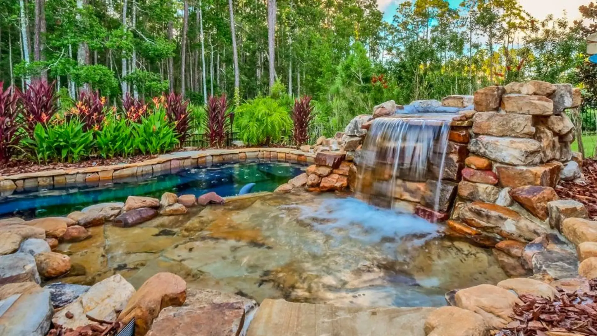 Natural-Nocatee-Waterfall Custom Designed Patios - Amelia Outdoors | Firepit Pleasure